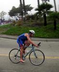 Dave races by on the bike.