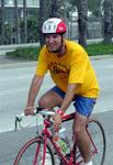 Greg on the bike with his Laker's shirt!