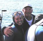 Brian gives Cherie one last hug before he lowers her into the shark cage.