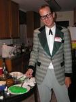 Greg dips into the green Jello Anne made.