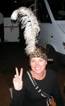 Kristi tries to blend in with her ostrich feather hat.