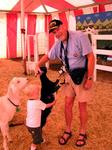 A goat comes between Dad and Tanner.