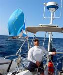 Ray at the helm, with Cassiopeia behind. *Photo by Stacey.