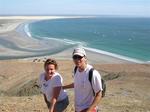 Cherie and Greg with Bahia Santa Maria behind them.