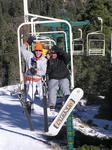 Jean and Lisa try not to fall off the lift.