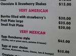 At the local restaurant you can order the "Very American" breakfast of "Burrito Filled With Strawberrys."  It reminds me of when I was in Brazil and I ate a "California Burger" that consisted of a patty with fruit cocktail on top. 