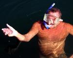 Rennie plays with a jelly-fish.  