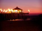 The Huntington Beach Pier beings to glow.