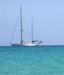 Cassiopeia, a Swan 65, rests while the "crew" plays on the beach.