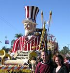 Greg and Cherie hanging out in front of Uncle Sam.  You have to be a big man to wear a suit of white and red carnations.