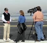 News crews interviewed former USS Midway Commanding Officer RADM Riley Mixson.
