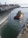 Sailors prepare to release the lines.