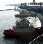 The tugs are all lined up, ready to push and pull.