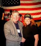 Cherie shakes hands with Congressman Randy "Duke" Cunningham.