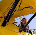 Note to ladies: Don't worry about doing your hair before an open-cockpit airplane ride. *Photo by Norm


