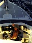 Cherie at the helm of a fishing boat in Mexico.