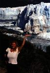 Cherie holding up Moreno Glacier in Argentina.