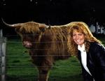 One of us is having a "bad hair day".  Cherie with a Harry Coo in Scotland.