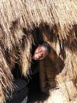 Annette, from the USA, makes herself at home in a hut.