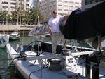 Lynn takes off the sail cover before we leave the dock.