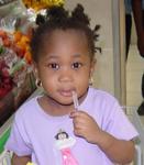 Adorable girl in the grocery store.