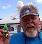 Lee holds our good luck charm, called "the ju ju".  It's an old chicken bone and a silly toy frog.  Sailors are just plain weird sometimes.