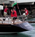 The crew of Chippewa, a Swan 68, waves hello.