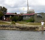 Joe waves from The Last Resort.  We had to take a ferry to get there.