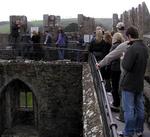 The line of tourists to kiss the Blarney Stone.  Kissing the stone gives the smoocher the "eternal gift of elequence."  Or as the Irish say: "It gives you the gift of gab."