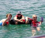 Jean, Cherie and Carol enjoy a dip and a drink. *Photo by Dustin.