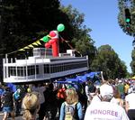 A boat floating on a sea of runners.