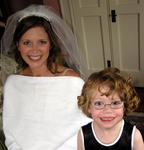 Kristi with Hanna, the flower girl.