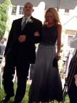 Kristi's father (Steve) walks the mother of the bride (Claudia) down the aisle. *Photo by Karen.