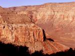 The dusty red canyon in the early morning sun.