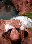 Cherie overlooks Mooney Falls, the largest of the three waterfalls within Havasupai Indian Reservation. *Photo by Jean.