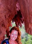 Cherie with interesting rock formations.