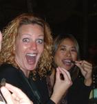 Cherie and Renee eat Mopani worms for the first and last time.  That's enough "culture" for one lifetime.
