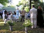 Everyone stands as the flower girls enter.