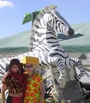 Cherie and Margaret by a desert zebra.