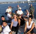 The hard-working crew slaving away as the sun sets.