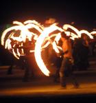 Fire-dancers light up the playa.