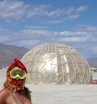 Cherie in a sand-storm protected by a scuba mask and belly-dancing skirt. *Photo by Jean.