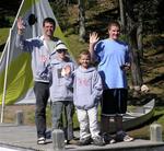 The Sullivans wave from the dock.