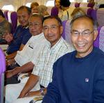 Han, Joe, Ohn and Eddy on the plane.