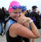 Cherie does her first triathlon in Long Beach, California.  Go #751.