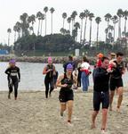 Coming out of the swim and up the beach.