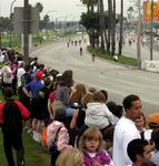 Crowds watch as the cyclists make 2 loops around the course.