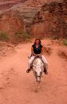 Cherie, on the mule-ride out of the canyon. *Photo by Jean.
