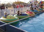 The kids ready to race bumper boats.