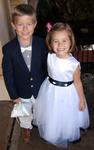 The ring bearer and flower girl.